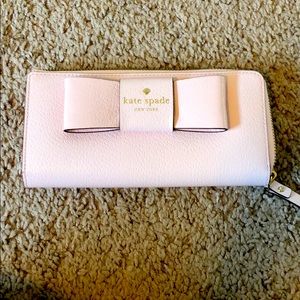 Pink Kate Spade long wallet with bow